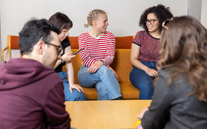 Students sitting in a group.