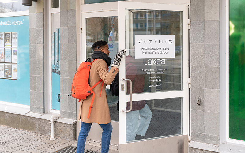 A student enters a service unit.
